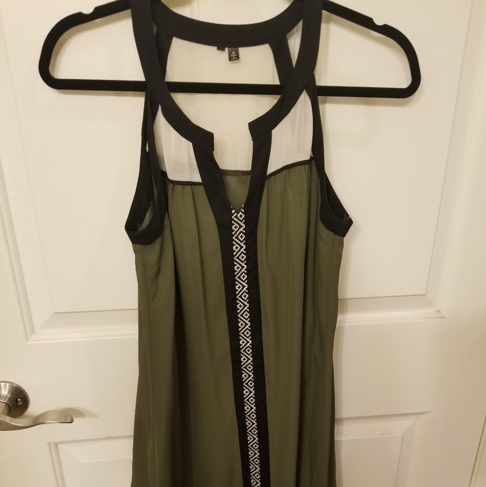 Cutesy dress is medium. White fabric is sheer.